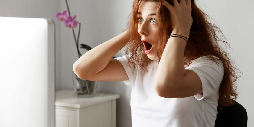 A women screaming in panic A women screaming in panic