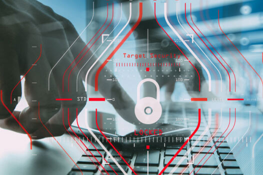Out of date software remains a problem Security target locked onto a desktop keyboard