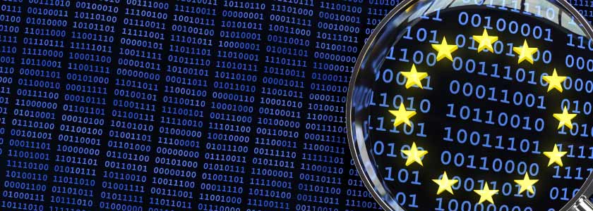 A magnifying glass looking at binary and the EU flag