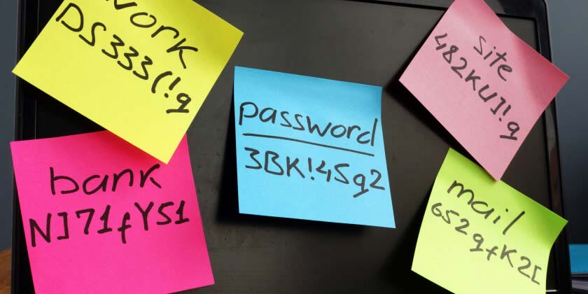 Assorted stickynotes with passwords written on them