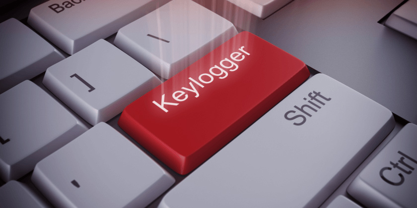 A red keylogging button on a keyboard