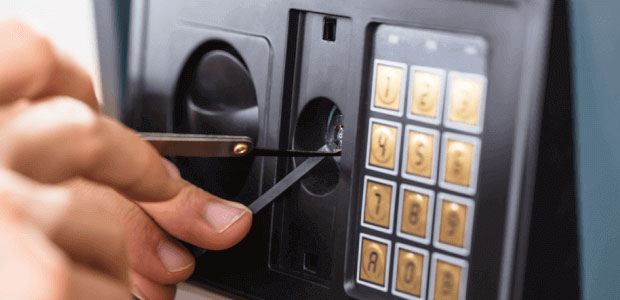 A safe which is being lock-picked