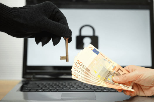 Hacking for profit A hand swapping a key for cash